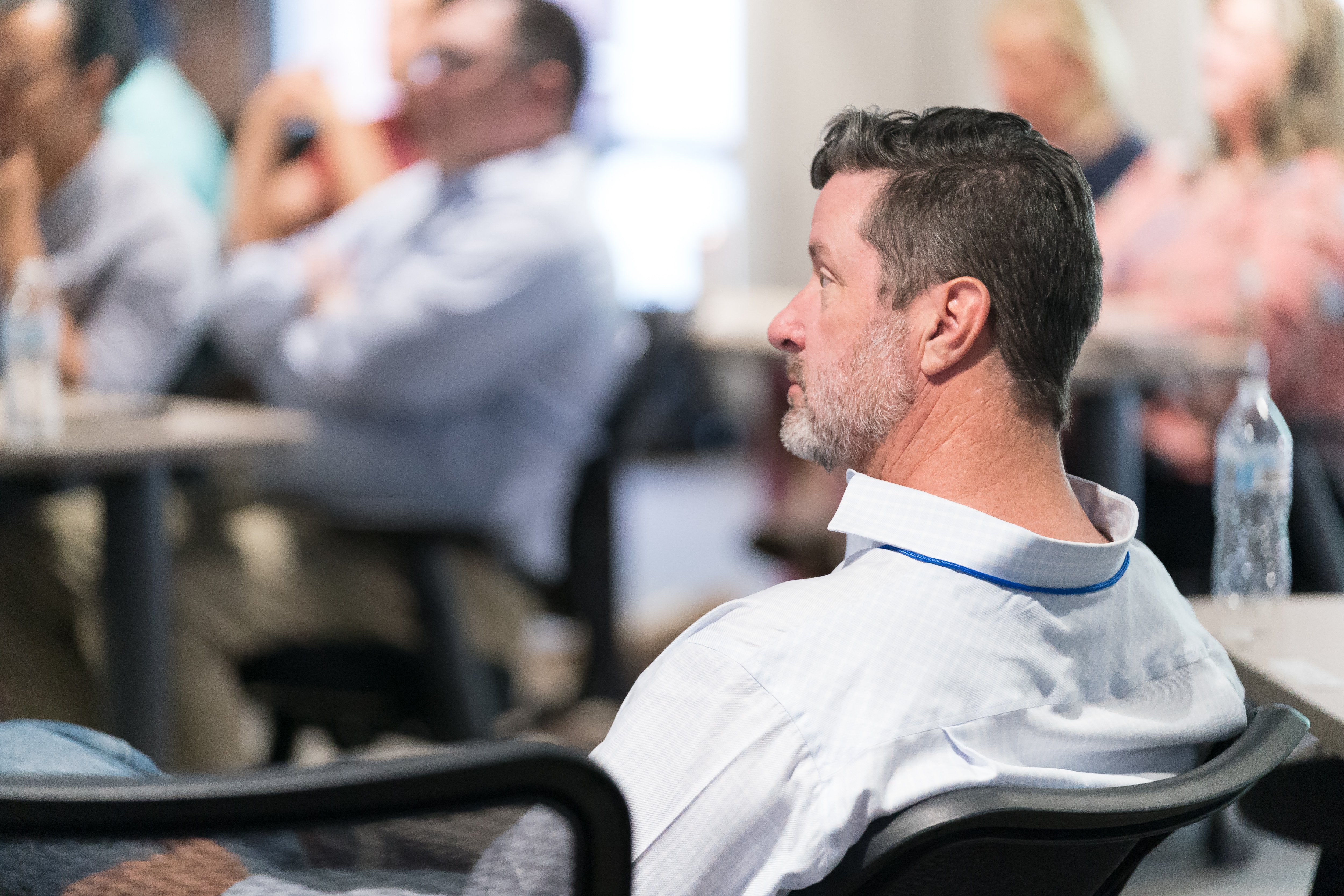 Rich McHattie watching Arizona Modernization Day Presentations